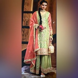 Stunning Lehnga/Sharara Suit. Ready to wear with intricate hand embroidery.